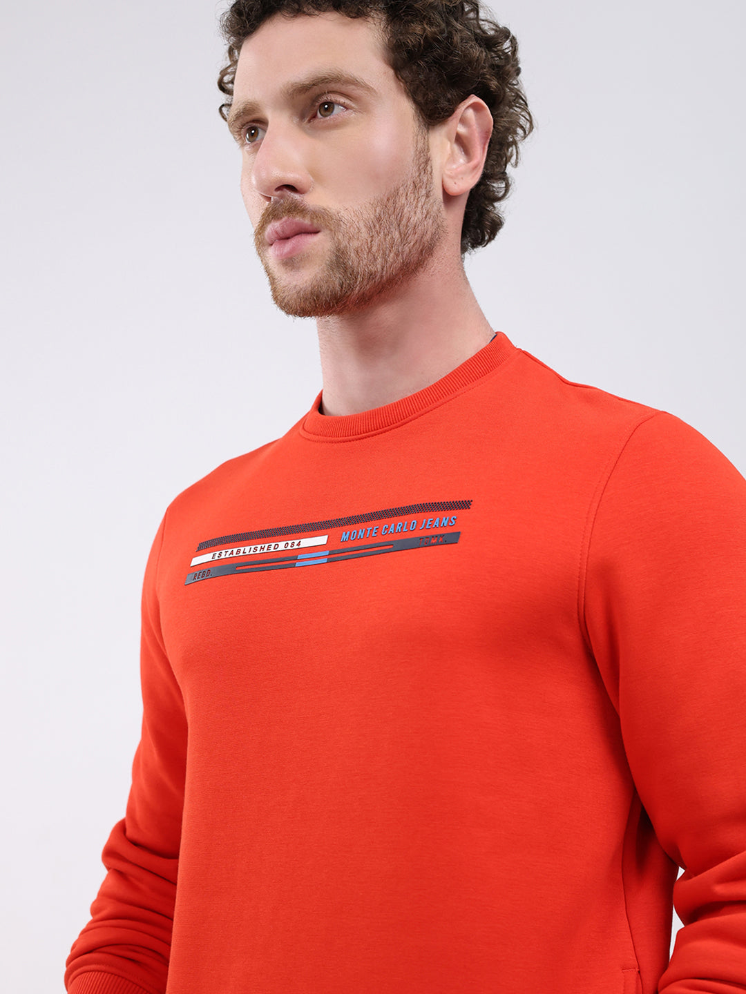 Men Orange Printed Round Neck Full Sleeve Sweatshirt
